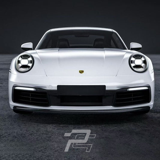 White Porsche car on a dark background